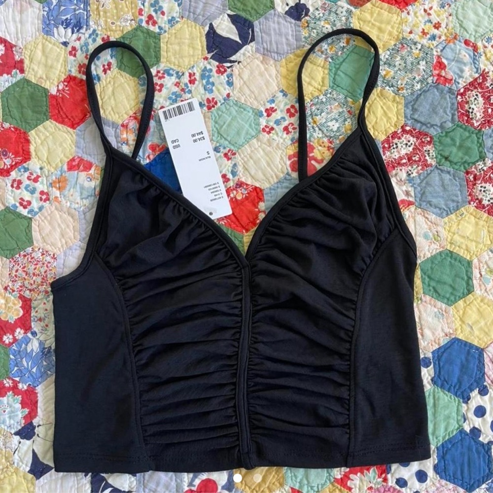 Classic black tank. Super comfy and stretchy.